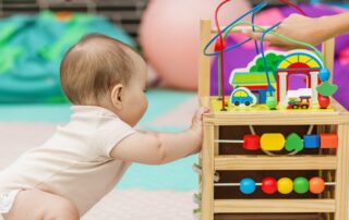 baby playing nursery